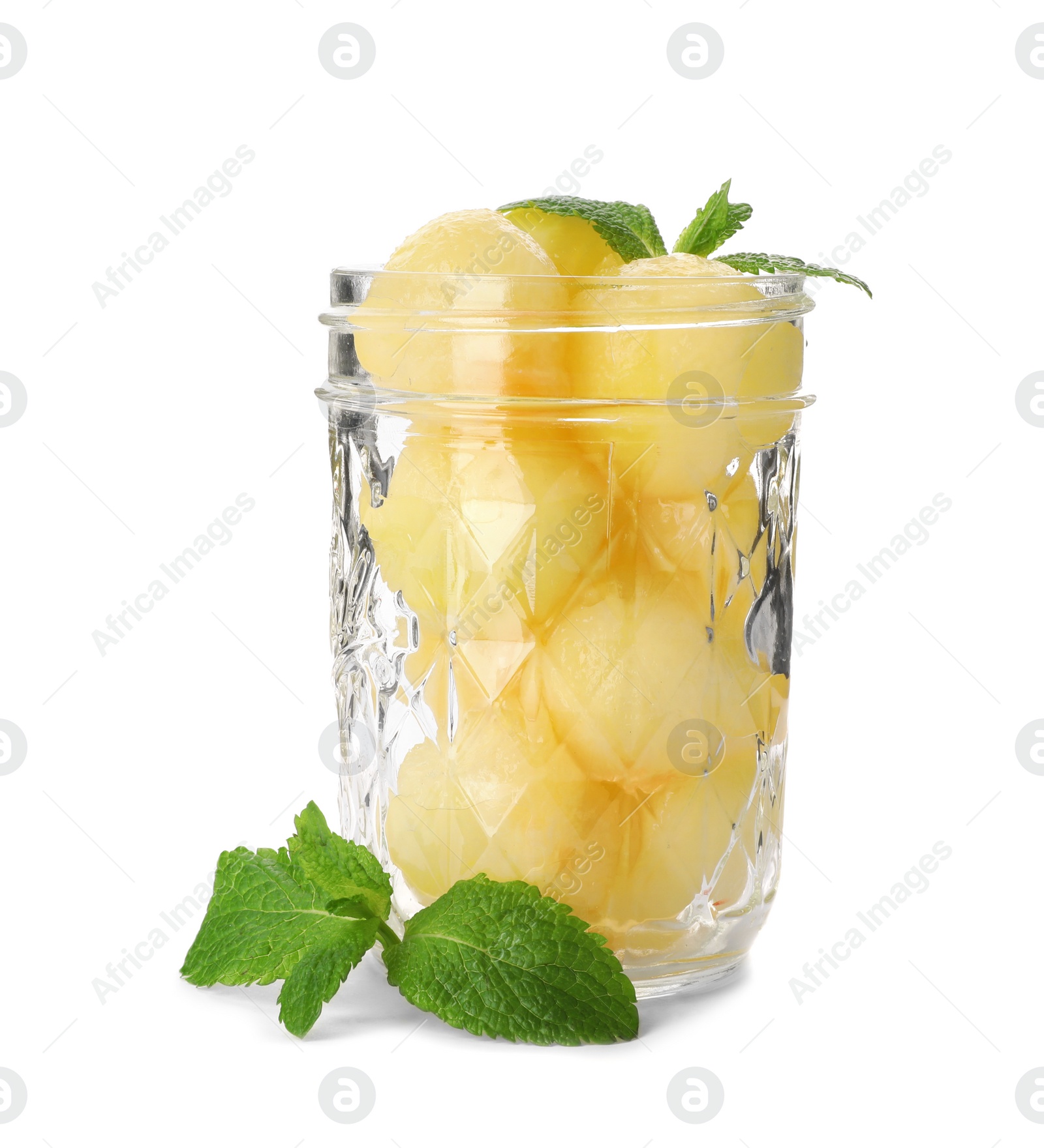 Photo of Jar with melon balls on white background