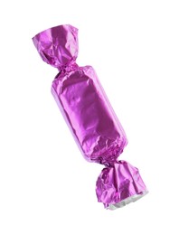 Tasty candy in violet wrapper isolated on white