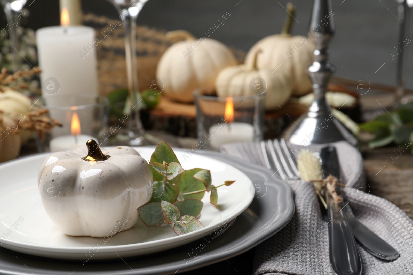 Photo of Beautiful autumn place setting and decor on table, closeup