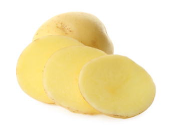 Photo of Whole and cut fresh raw organic potatoes on white background