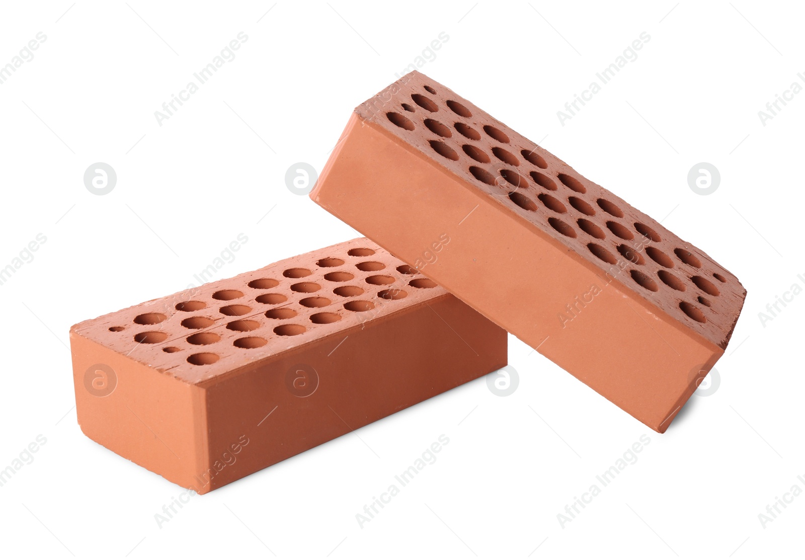 Photo of Two red bricks isolated on white. Building material
