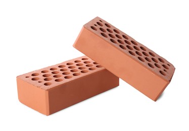 Two red bricks isolated on white. Building material