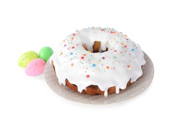 Easter cake with sprinkles and painted eggs isolated on white