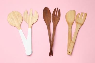 Photo of Set of modern cooking utensils on pink background, flat lay