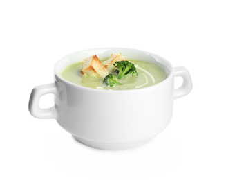 Photo of Delicious broccoli cream soup with croutons isolated on white