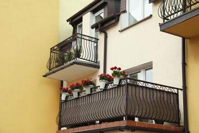 Photo of Stylish balconies decorated with beautiful potted plants