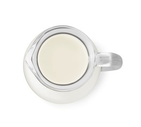 Glass jug of fresh milk isolated on white, top view