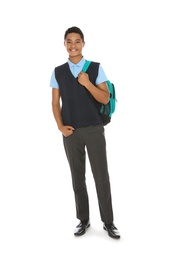 Photo of Full length portrait of African-American boy in school uniform with backpack on white background