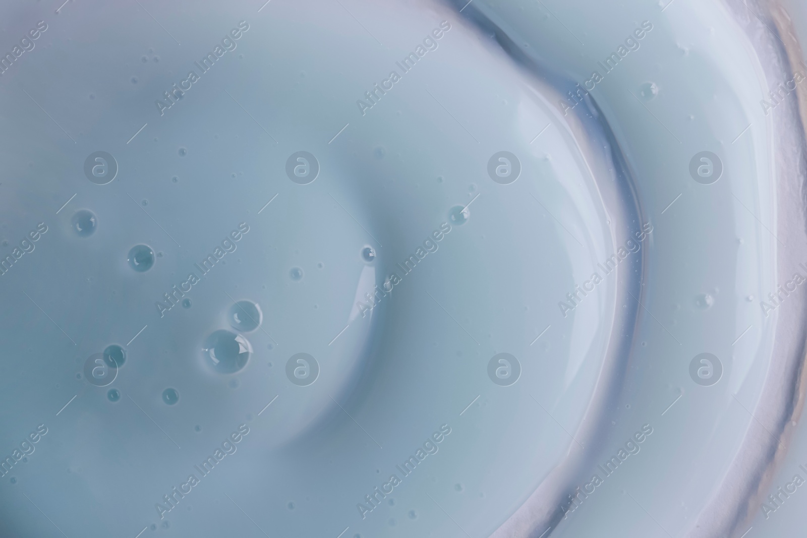 Photo of Texture of white shower gel as background, top view