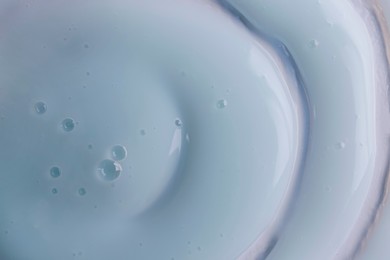 Photo of Texture of white shower gel as background, top view