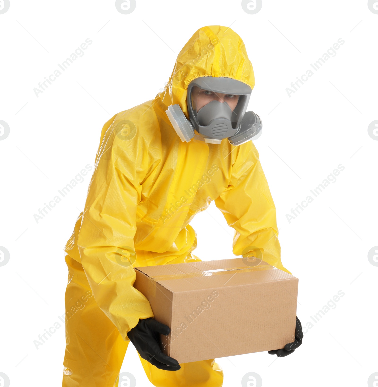 Photo of Man wearing chemical protective suit with cardboard box on white background. Prevention of virus spread