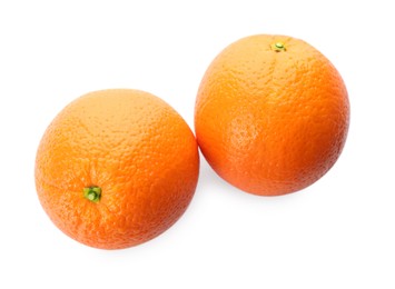 Delicious fresh ripe oranges on white background, top view