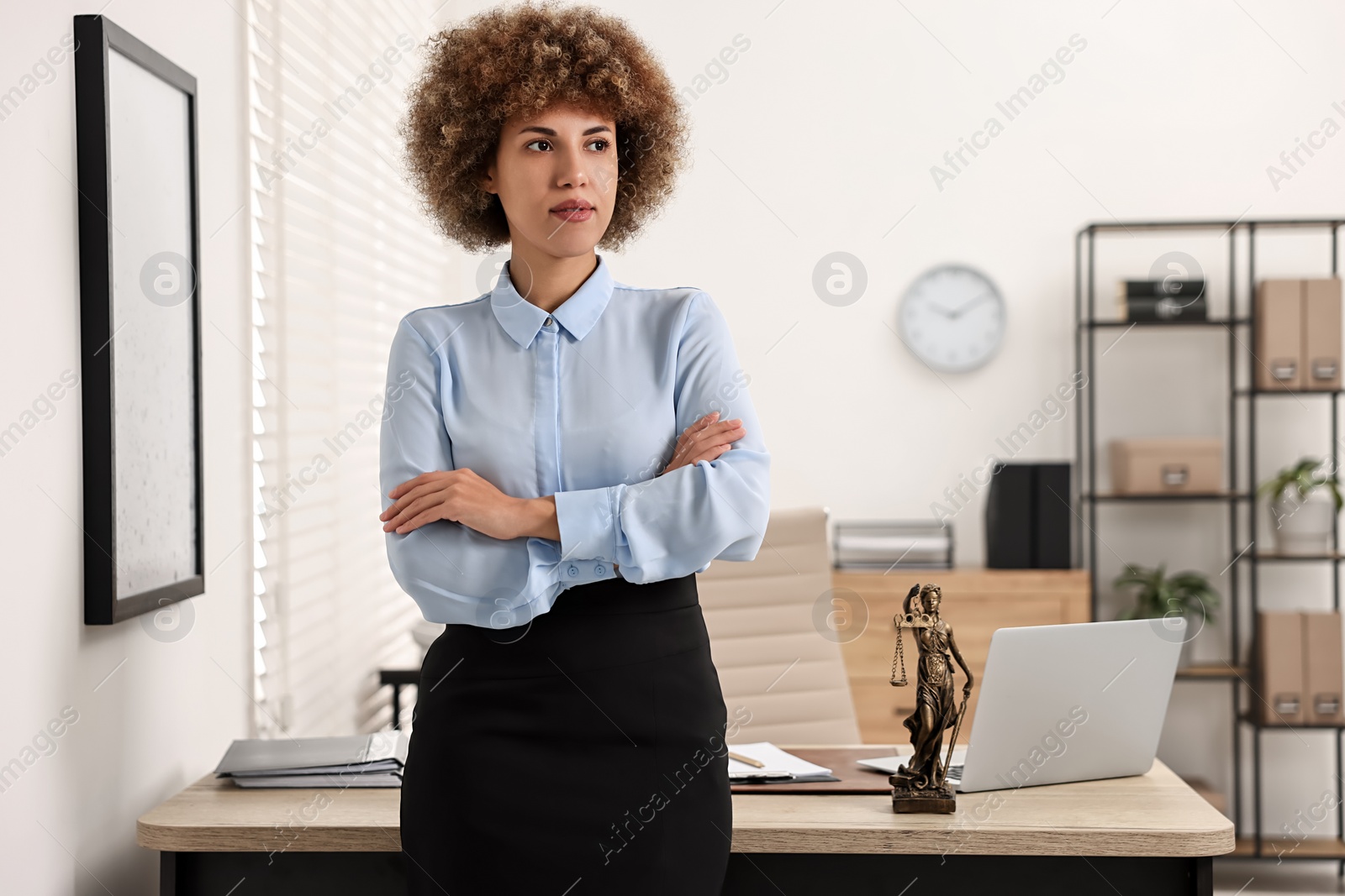 Photo of Portrait of beautiful female notary in office