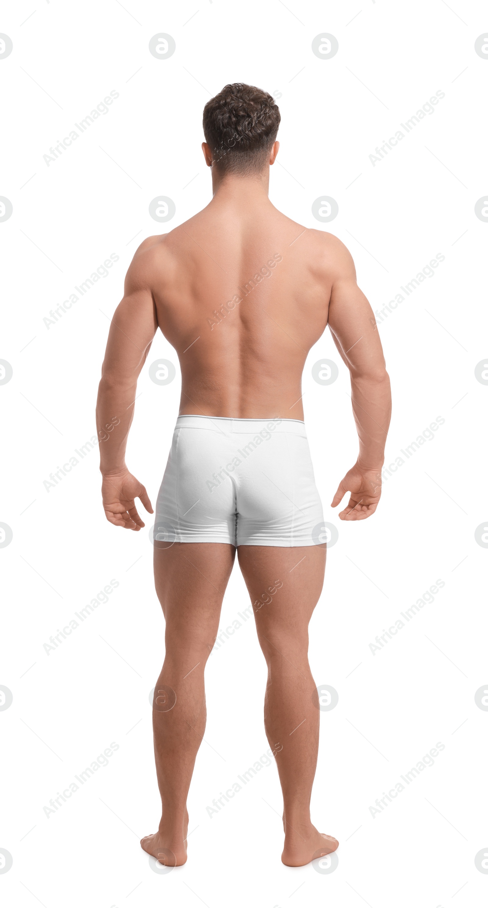 Photo of Muscular man isolated on white, back view. Sexy body