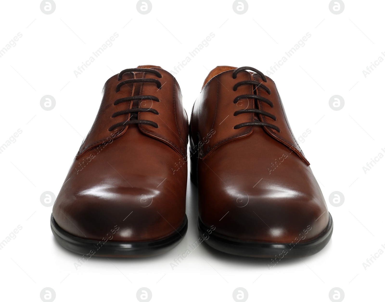 Photo of Classic wedding shoes for groom on white background