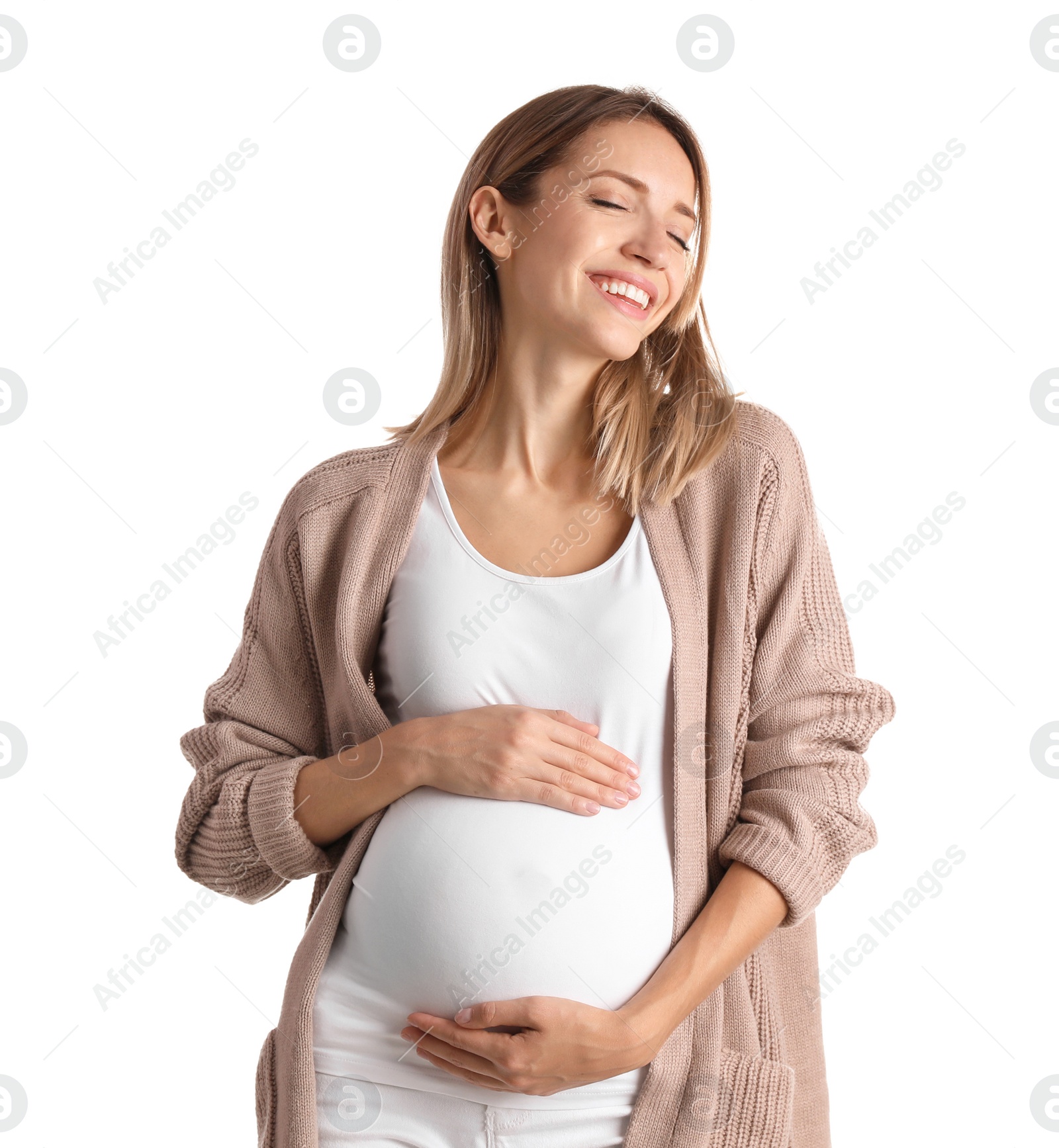 Photo of Happy pregnant woman touching her belly on white background