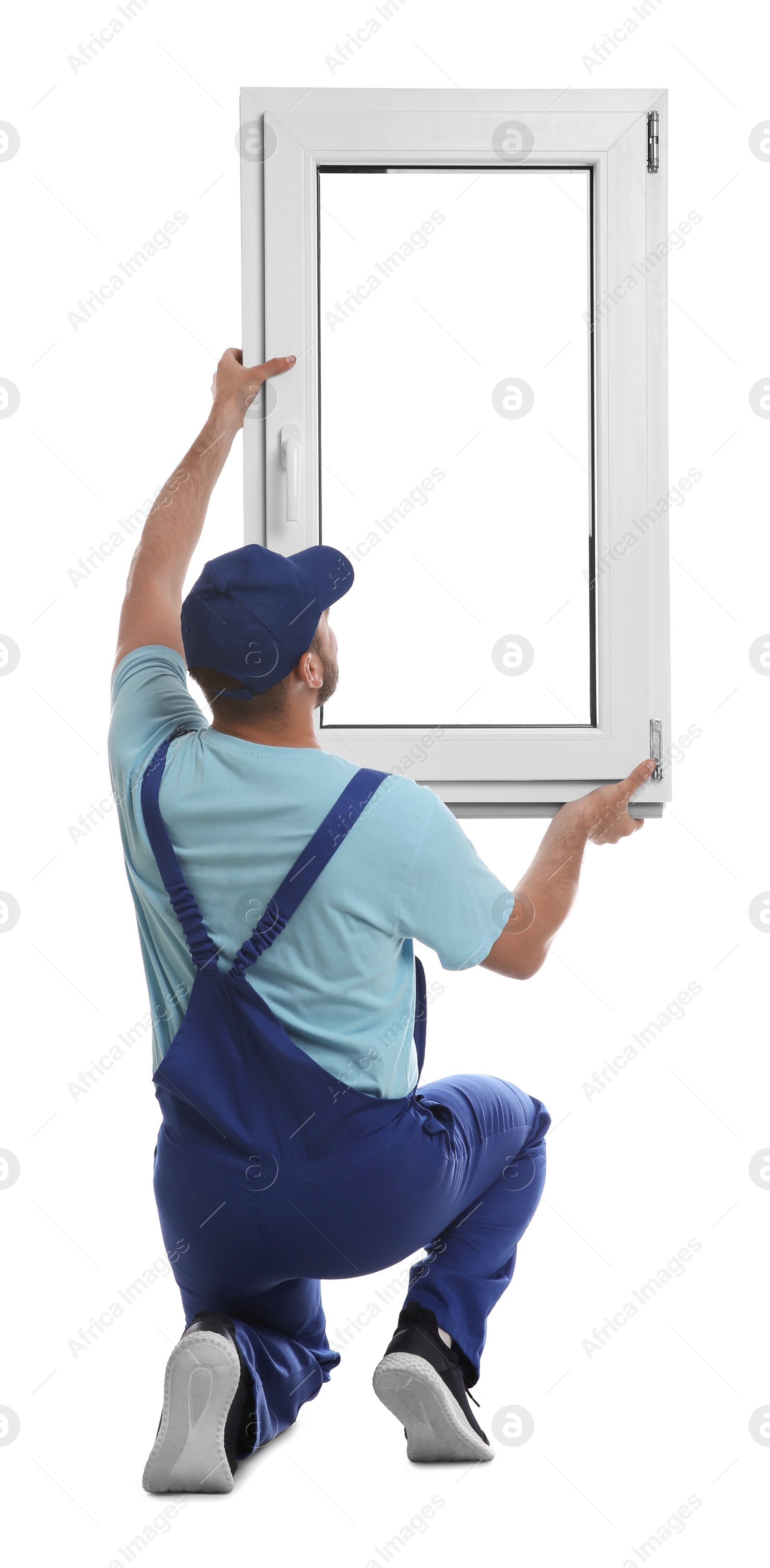 Photo of Worker with plastic window on white background, back view. Installation service