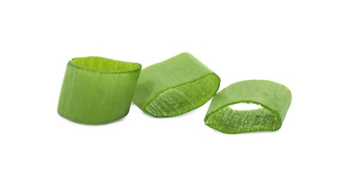 Photo of Pieces of fresh green onion isolated on white
