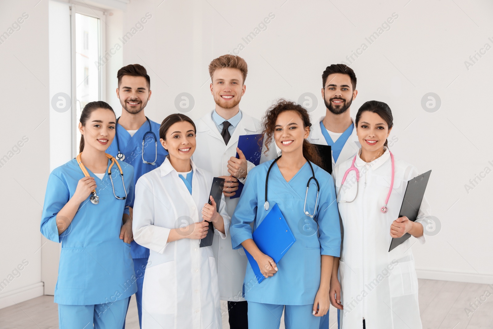 Photo of Team of medical workers in hospital. Unity concept