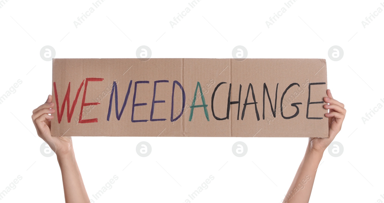 Photo of Protestor holding placard with text We Need A Change on white background, closeup. Climate strike