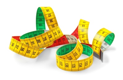 Measuring tape on white background