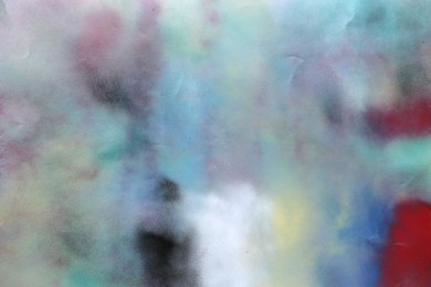 Photo of Texture of abstract spray paint as background, top view