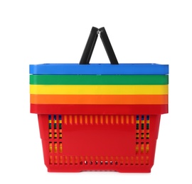 Photo of Colorful plastic shopping baskets on white background