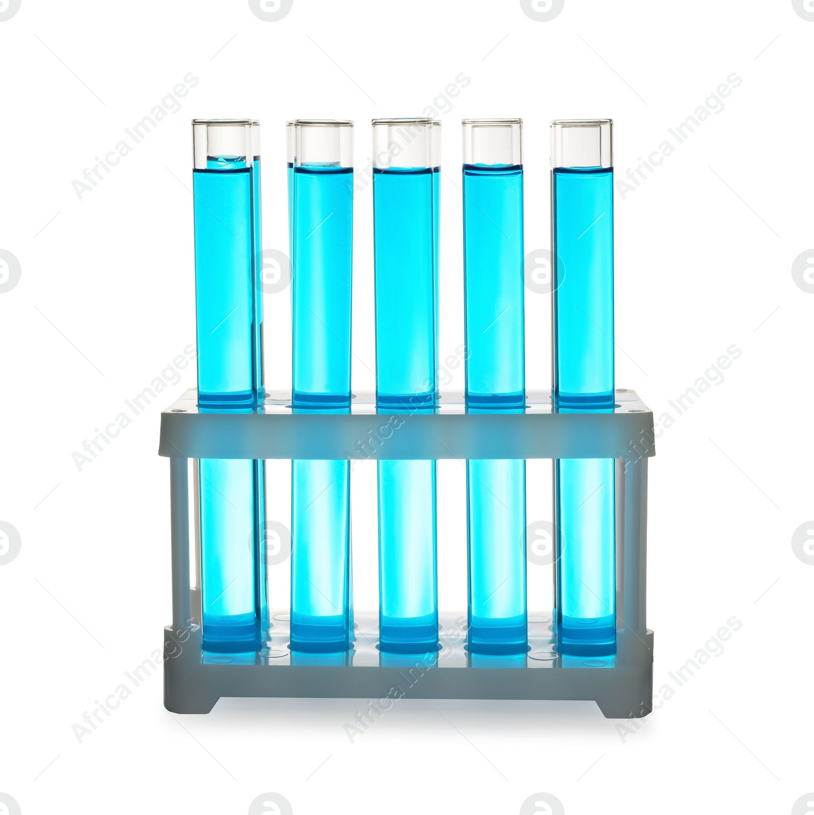 Photo of Test tubes with blue liquid on white background