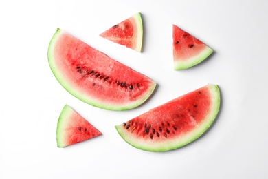 Photo of Flat lay composition with slices of watermelon on white background