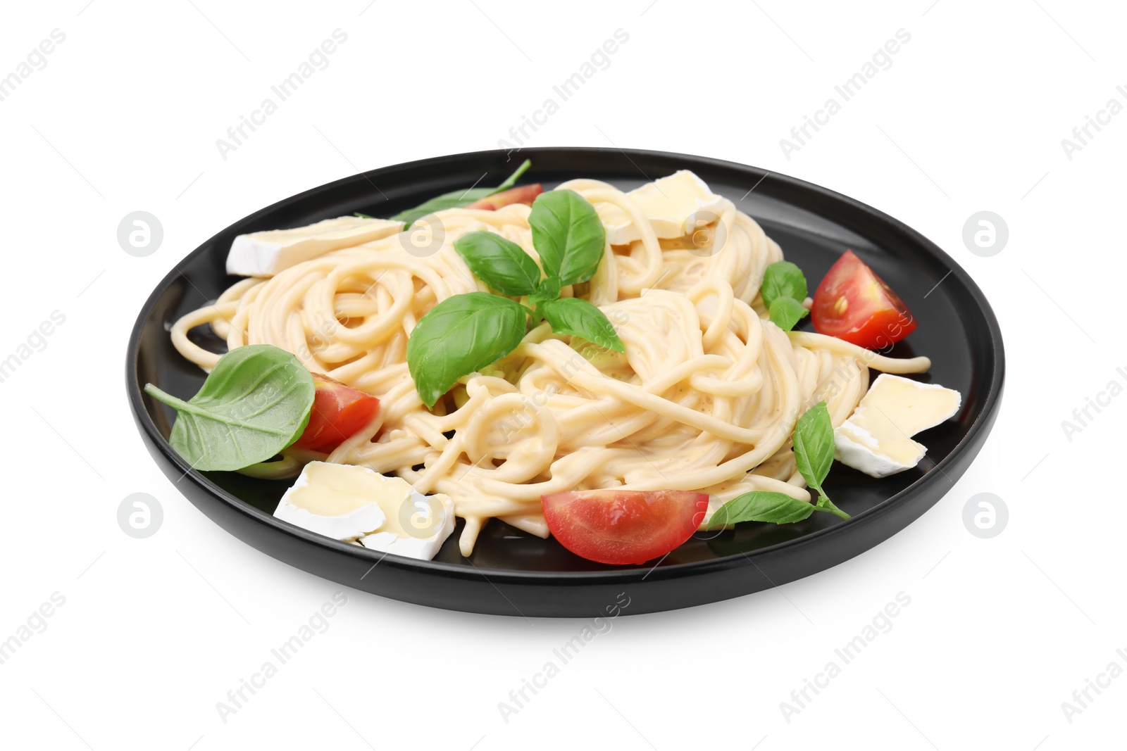 Photo of Delicious pasta with brie cheese, tomatoes and basil leaves isolated on white