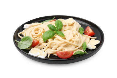 Delicious pasta with brie cheese, tomatoes and basil leaves isolated on white