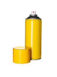 Colorful cans of spray paints on white background