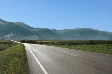 Image of Empty asphalt road in mountains. Picturesque landscape