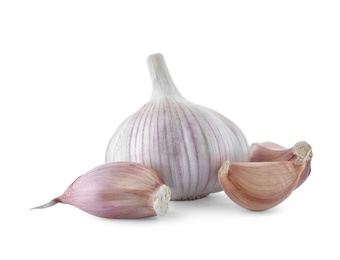 Photo of Fresh garlic bulb and cloves on white background