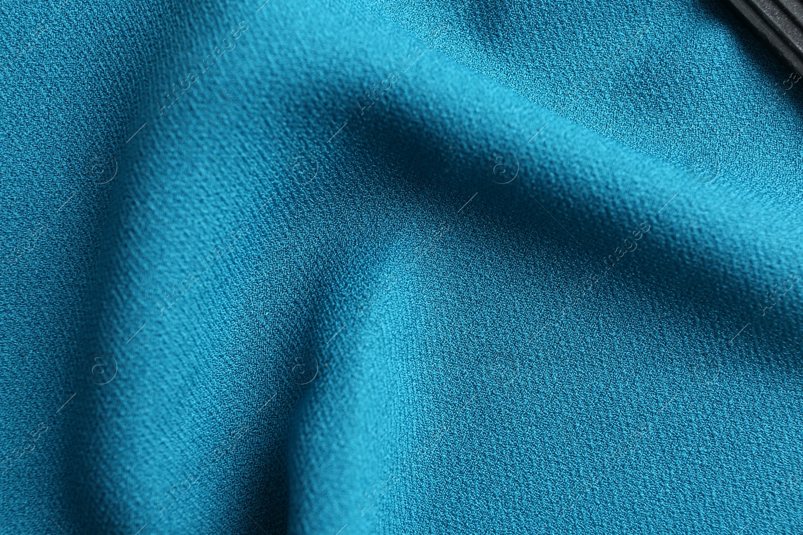 Photo of Texture of beautiful blue fabric as background, closeup