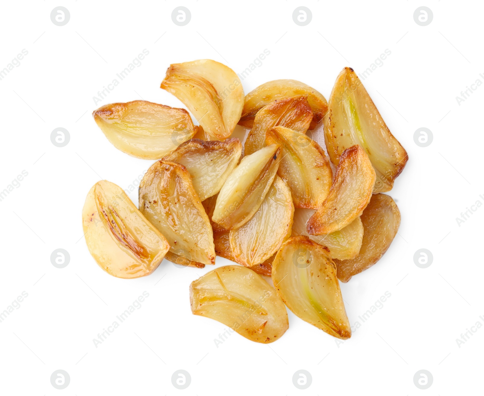 Photo of Pile of fried garlic cloves isolated on white, top view