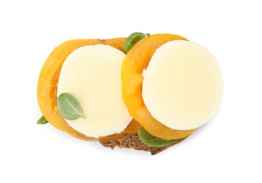 Photo of Delicious sandwich with mozzarella, yellow tomato and basil isolated on white, top view