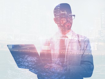 Double exposure of businessman and cityscape. Leadership concept