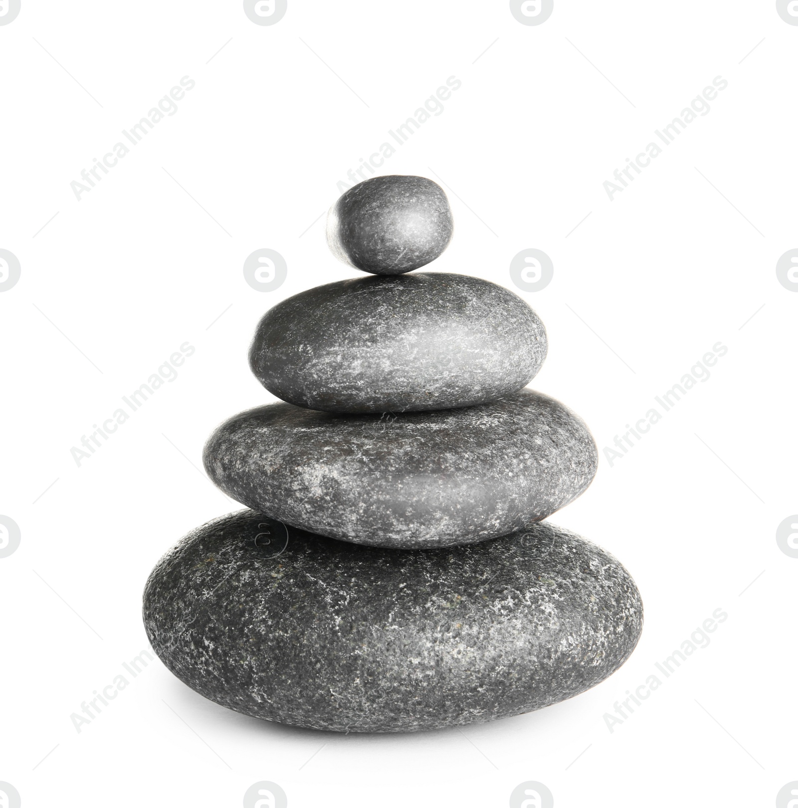 Photo of Stack of zen spa stones on white background