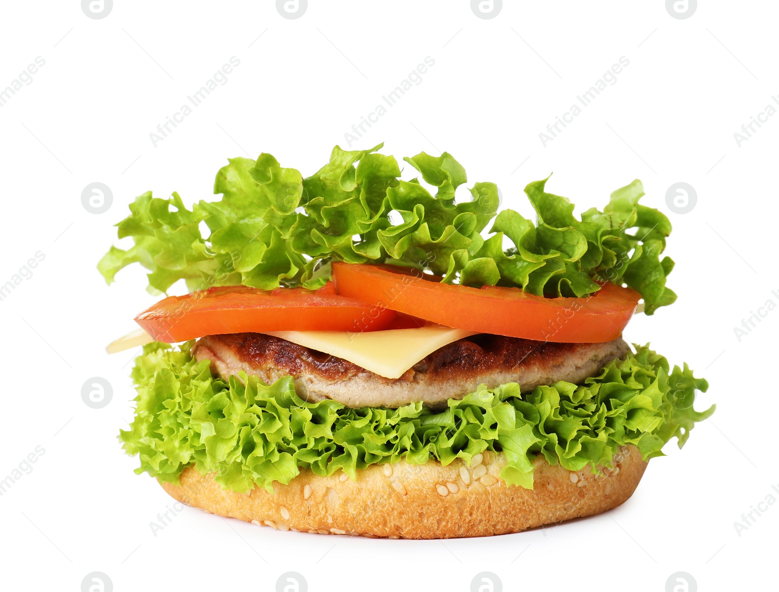 Photo of Burger bun with cutlet and vegetables isolated on white