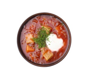 Photo of Tasty borscht with sour cream in bowl isolated on white, top view