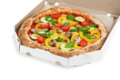 Photo of Delicious vegetable pizza in cardboard box on white background, closeup