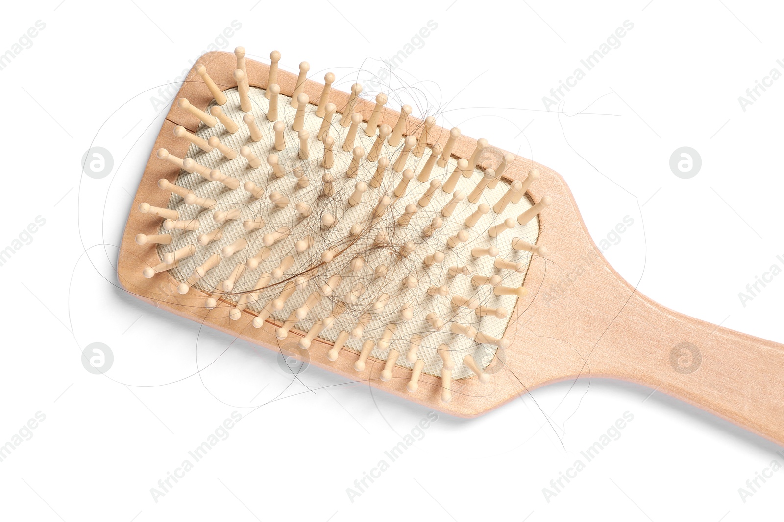 Photo of Wooden brush with lost hair isolated on white, top view