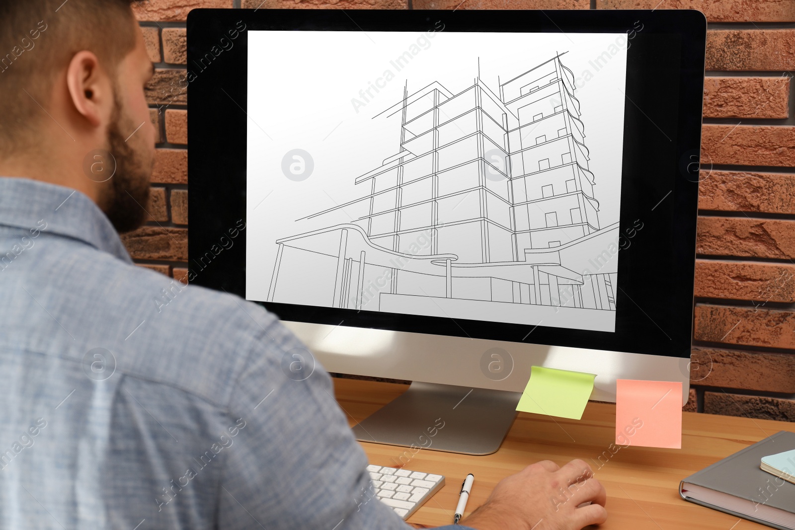 Image of Architect making project of house on computer in office, closeup