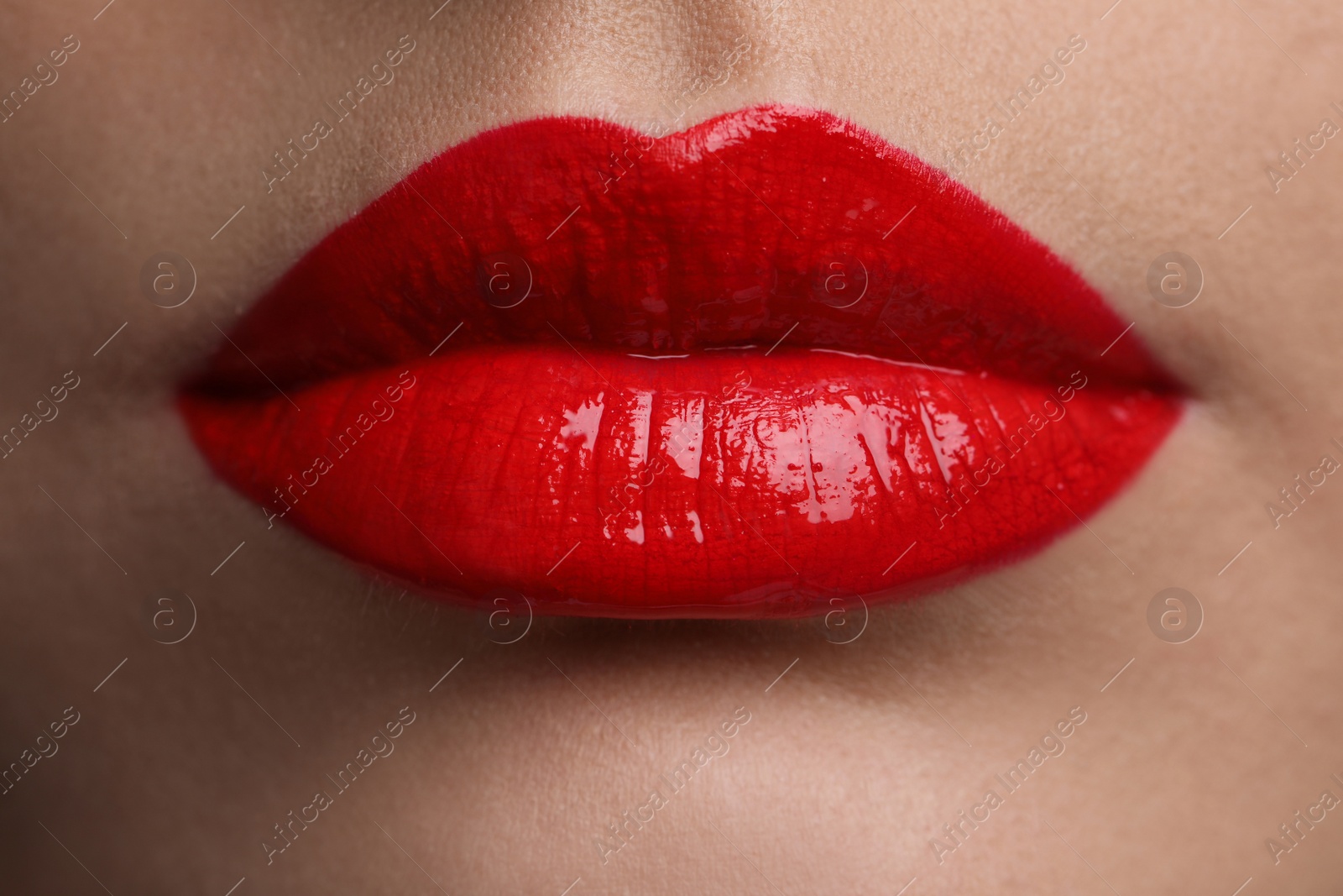 Photo of Closeup view of woman with beautiful full lips