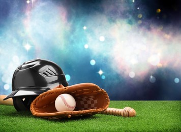 Image of Baseball bat, glove, helmet and ball on grass at stadium. Space for text