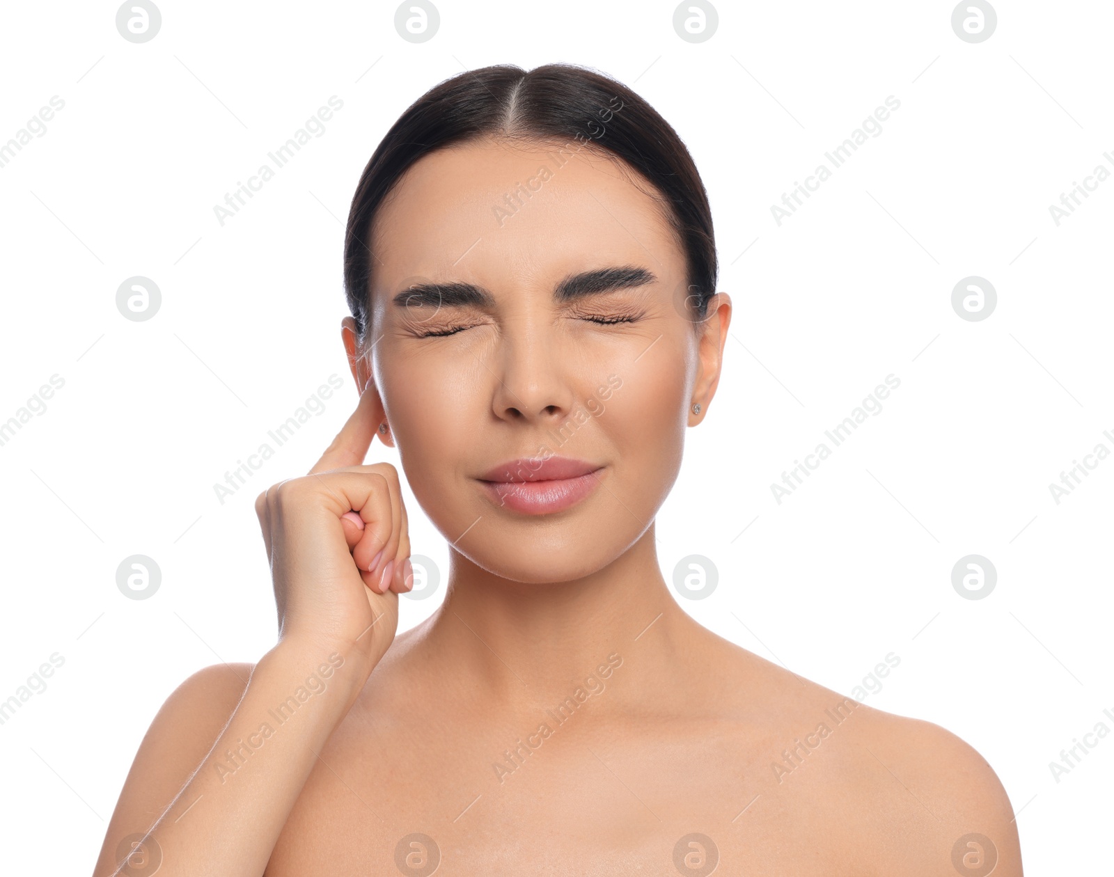 Photo of Young woman suffering from ear pain on white background