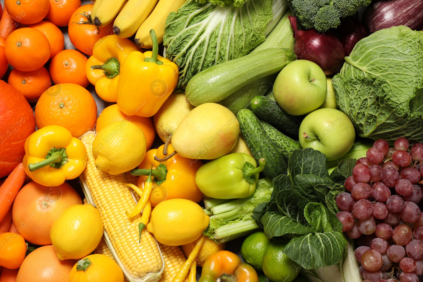 Photo of Assortment of organic fresh fruits and vegetables as background, closeup