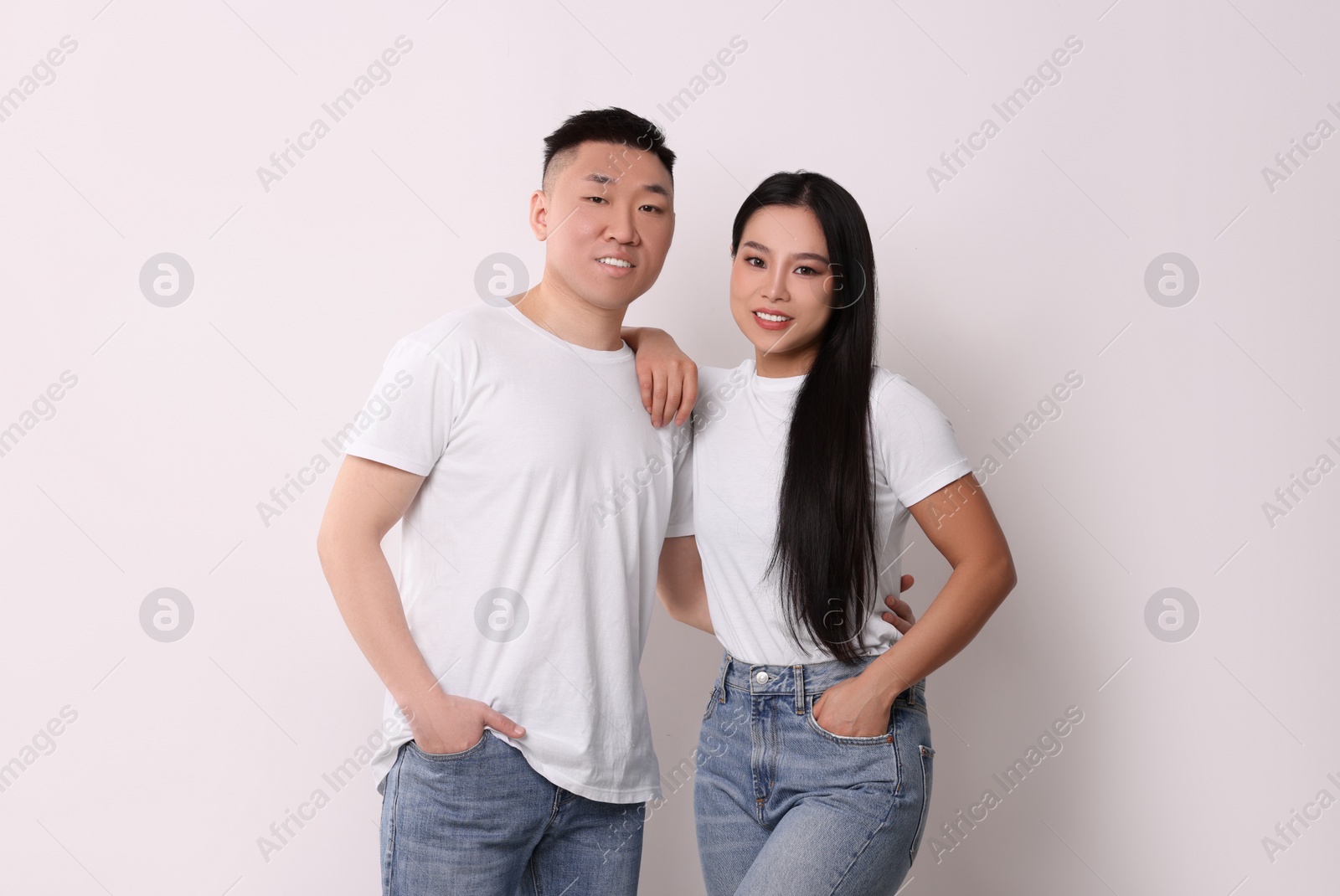 Photo of Portrait of happy couple on white background