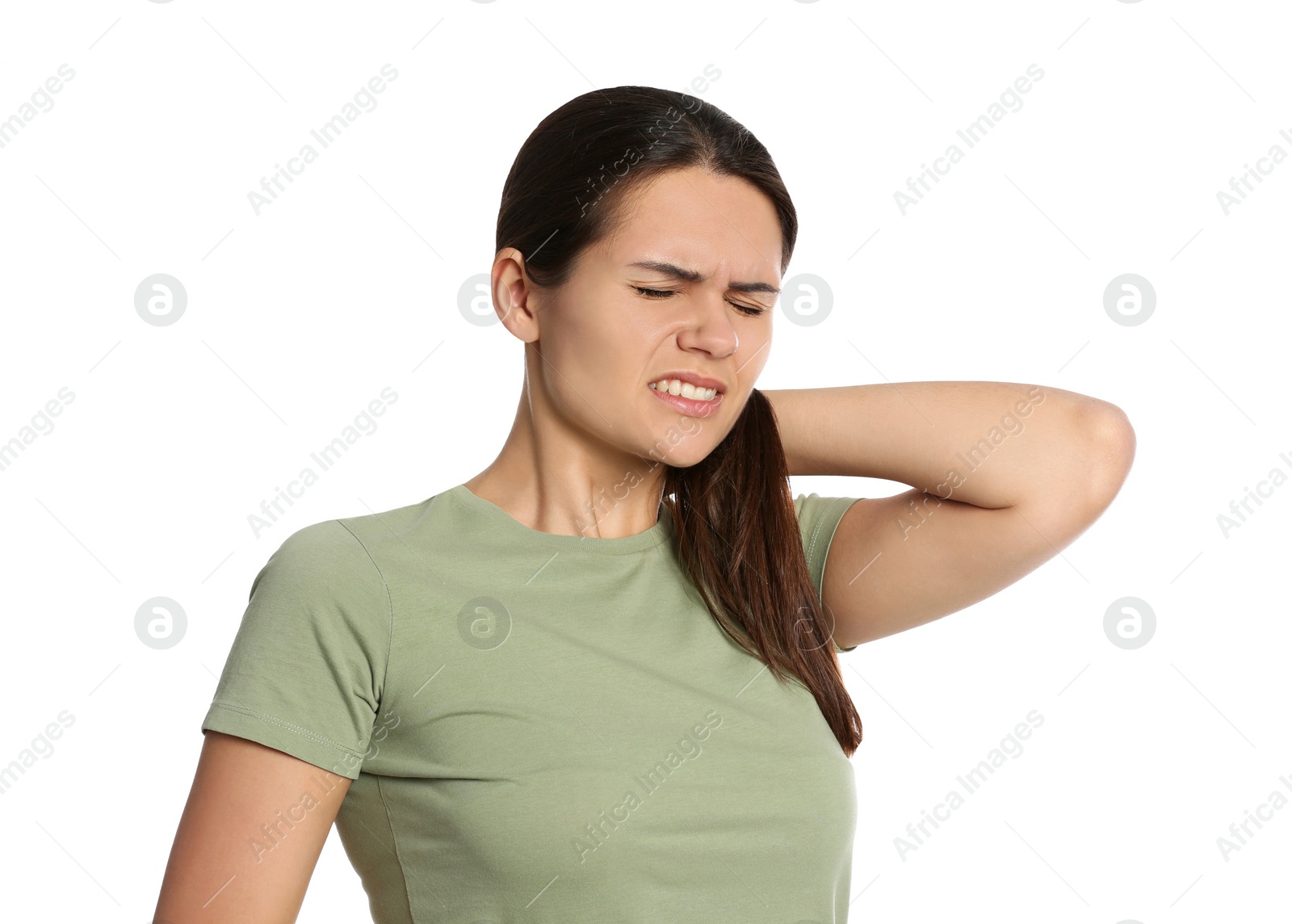 Photo of Young woman suffering from neck pain on white background